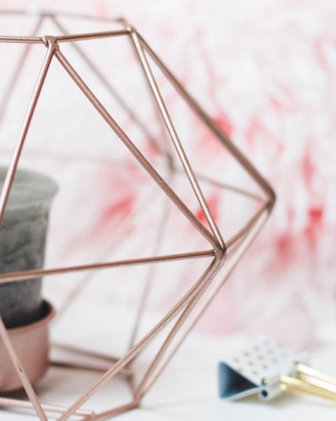 selective-focus-photography-of-candle-in-pink-ornate-holder